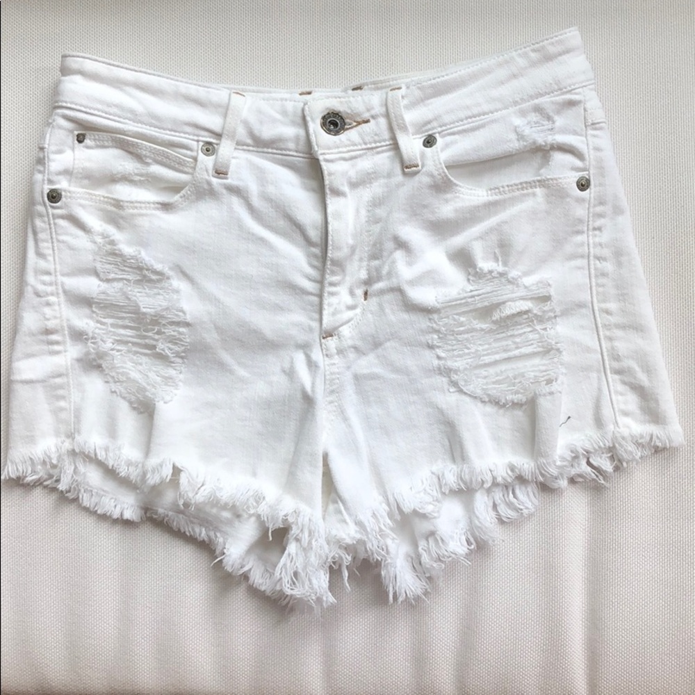Ripped white jean shorts
